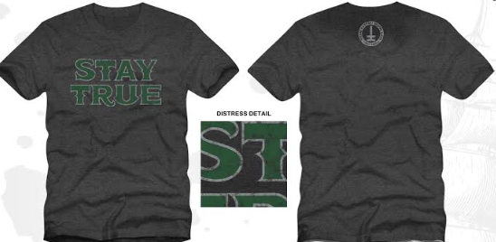 Available at True Tattoo Supply. Stay true! Large print on the front states the obvious, STAY TRUE, small True Tattoo logo on the back, Dark heather gray shirt with distressed print. Available in S-XXL