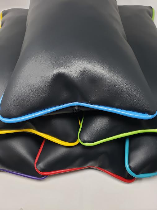 Available at True Tattoo Supply. The perfect Tattoo Pillow for your clients arms, legs, lower back or any other area to make your client comfortable and positioned properly for you to have a cozy and secure session. Sealed with all internal stitching, make it your most favorite, most sterile and wipeable Tattoo Pillow! Keep your pillow clean with new Tattoo Pillow Covers! New red, white, blue, teal, yellow, lime, PInk, Orange & Purple color piping now available!