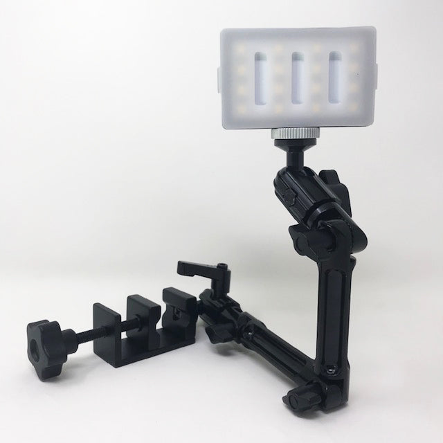 Available at True Tattoo Supply. The Tattoo Arm Rest Light Extension (light sold separately) gives the tattoo artist the convenience of a sturdy, cordless light extension while working. Comes with a 360° Multi Joint, Adjustable, Rotating, Secure, Locking extension. Fits most armrests, flat-edged tables, desks, lamps or work stations. ** LIGHTS SOLD SEPARATELY - CLICK HERE ** Extension Kit Includes (without light): 3 - arms 2 - elbow clamps 1- base clamp 1 - light screw 1 - Light / Phone Clamp