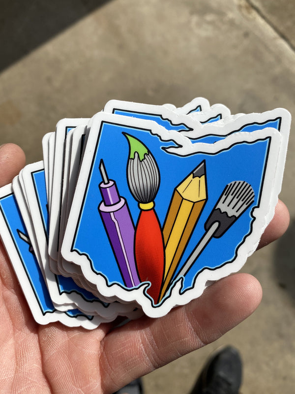 Available at True Tattoo Supply. Ohio Artist Stickers These die cut Ohio shaped stickers are perfect for every artist in Ohio! The perfect little gift or addition to your favorite household items, cars , skateboards, easels and more! Only $2 each