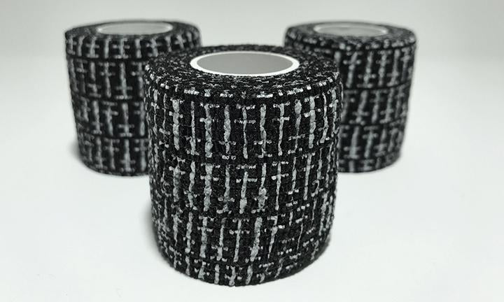 Available at True Tattoo Supply. Tattoo Grip Tape is a comfortable, self adhesive, expanding, cotton material tape wrap. Get your tattoo supplies from truetattoosupply.com. Machines, True Grips, True Tubes, Cartridge Needles, Arm Rest, Tattoo Grip Tape, Diamond, Rinse Cups, Ink, Pillows, Armrest Extension, Rogue Cartridge, Ergo Cartridge and more!